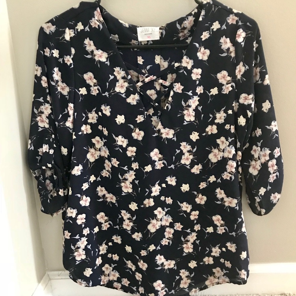 Navy floral blouse with criss cross front detail